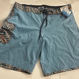 Billabong Teal and Black Geometric Board Shorts Recycler 73 Pro